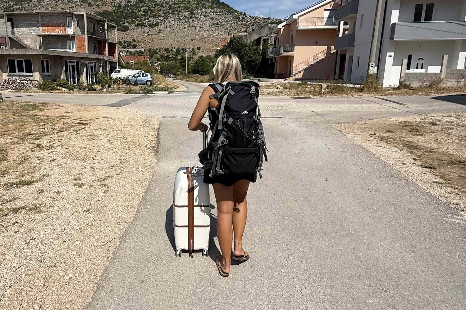Friends Make Major Mistake While Booking Their Airbnb, Then Have to Walk Across Bosnian Border with Suitcases (Exclusive) - Featured Image