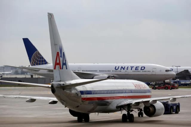 United and American Airlines hike up ticket prices at major US airport as rivalry heats up - Featured Image