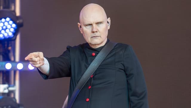 Smashing Pumpkins Singer Billy Corgan Mysteriously Claims the Government Contacted Him About ‘Things Way Above My Pay Grade’ - Featured Image
