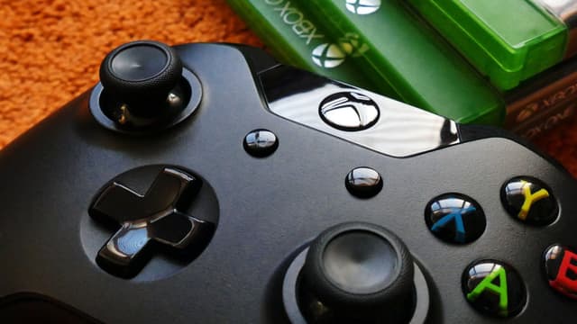 Don't Panic: Those Weird Xbox Dummy Messages Aren't a Hack—But They Are a Major 'Test to Prod' Fail | IBTimes UK - Featured Image