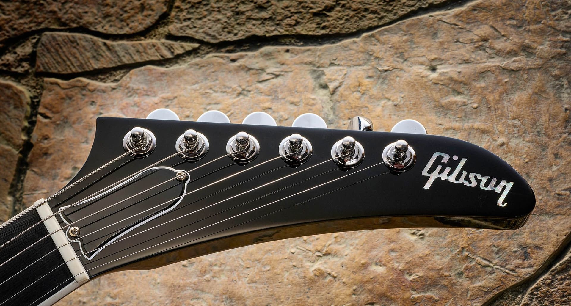 Is Gibson about to start making seven-strings and baritones? A NAMM tease all but confirms it - Featured Image