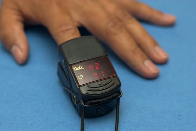Home fingertip oxygen monitors less accurate for people with darker skin tones - BMJ Group - Featured Image
