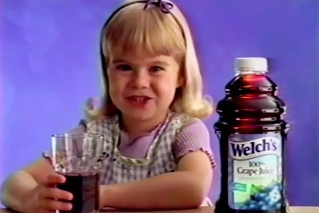 Welch’s 'Grape Juice Girl' Makes First Return to the Brand Since the ’90s Commercials — Here’s Where She is Now! - Featured Image