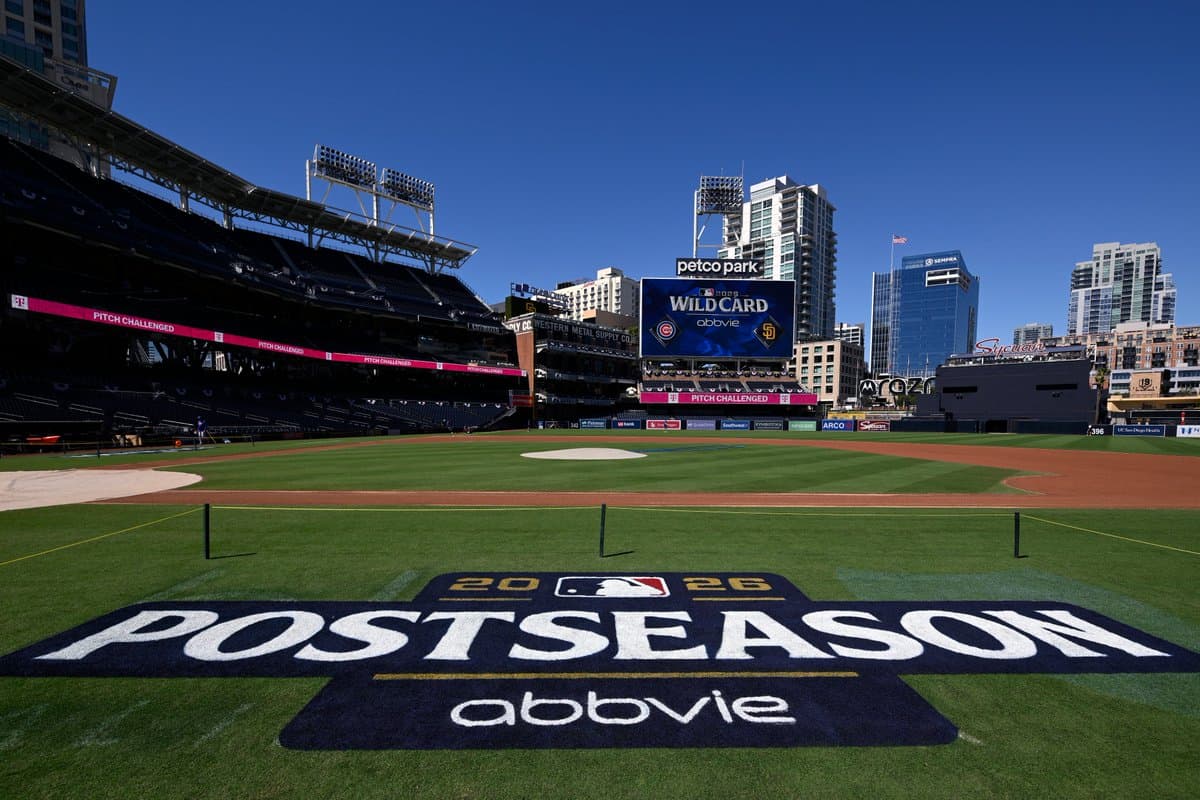 A picture of Petco Park, featuring the 2026 Wild Card matchup between the Chicago Cubs and San Diego Padres on the scoreboard, along with the Postseason 2026 logo painted along the first base line.